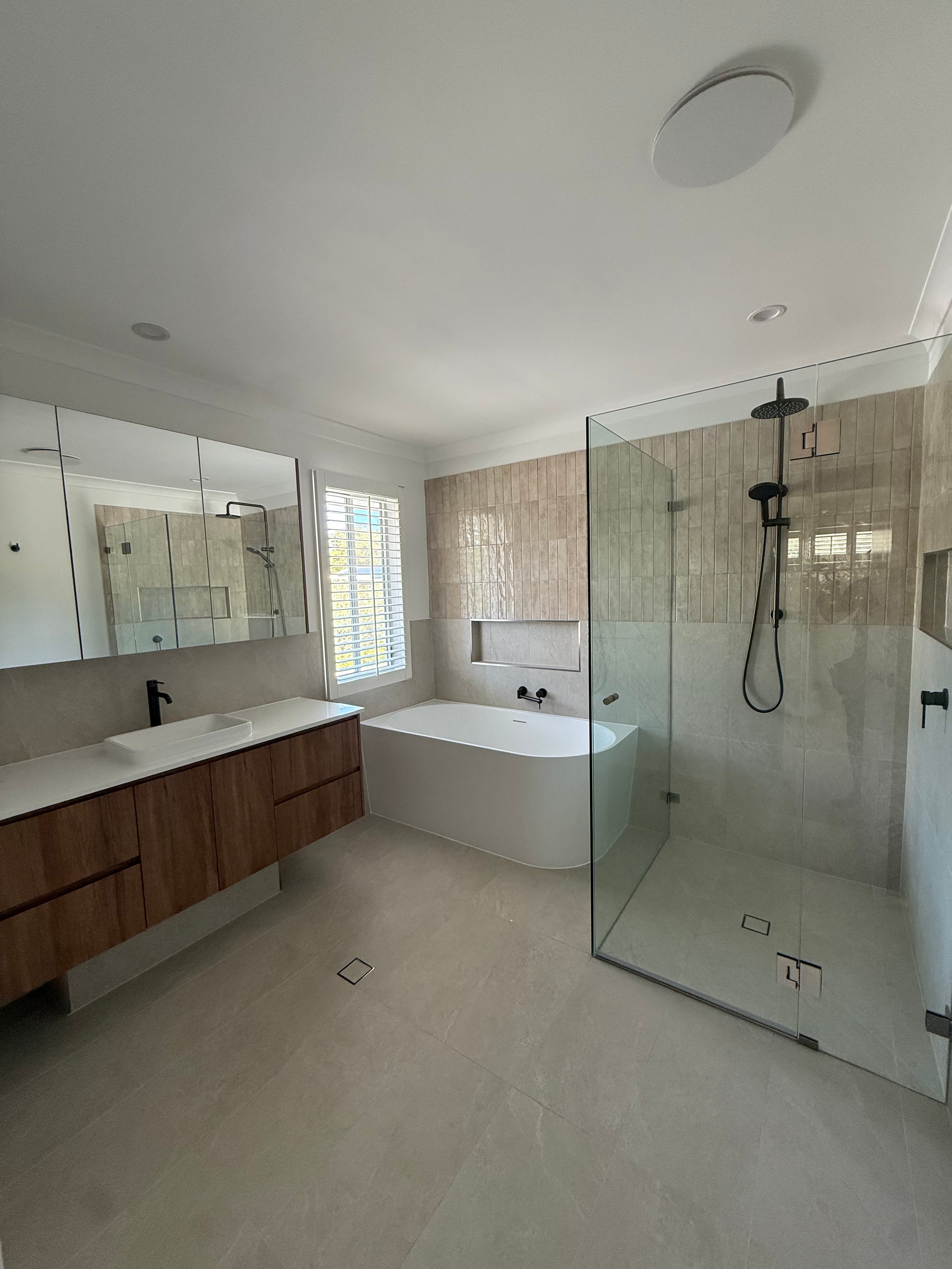 Spa Bathroom with Round Mirror