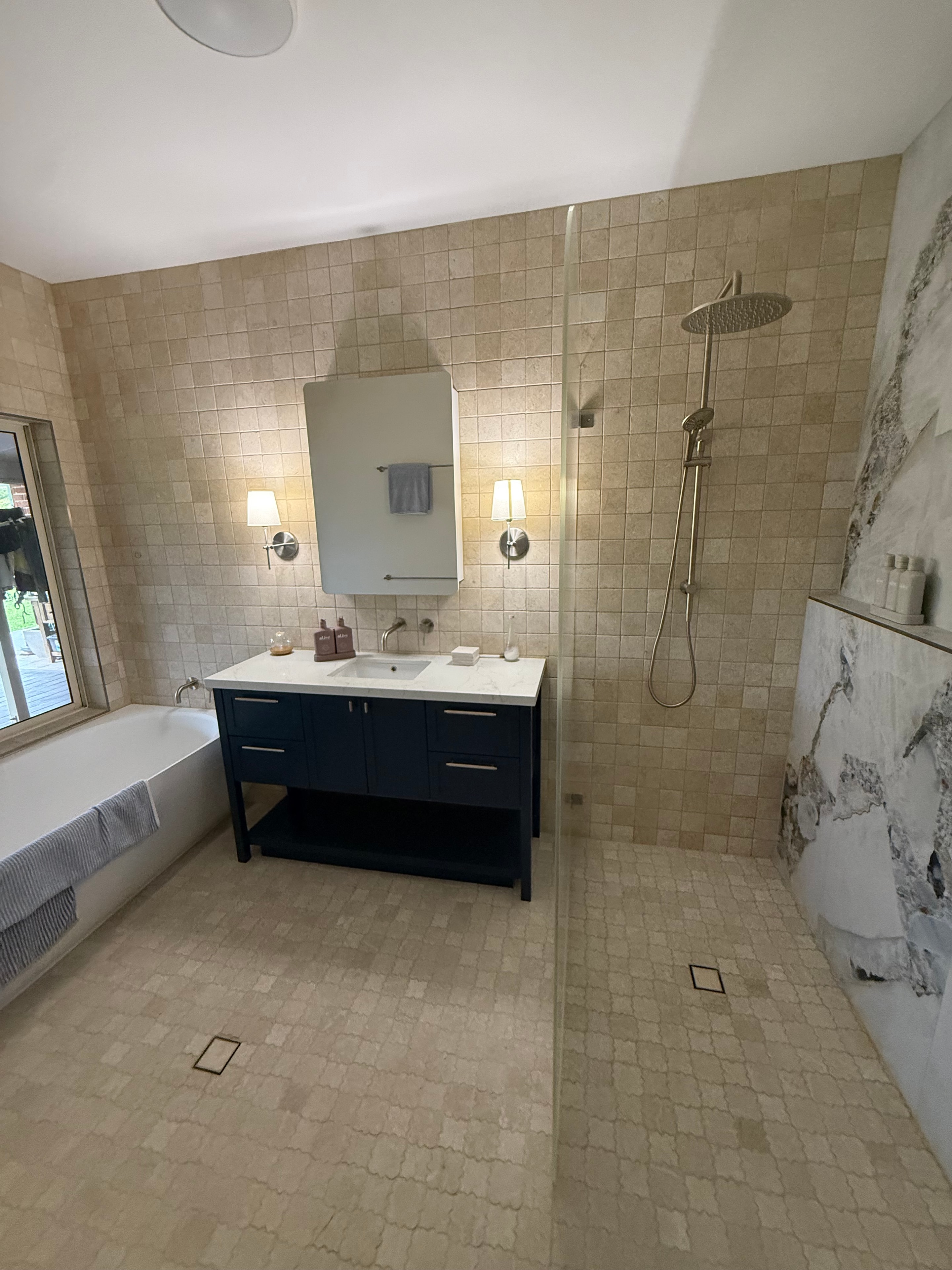 Travertine Bathroom with Navy Vanity